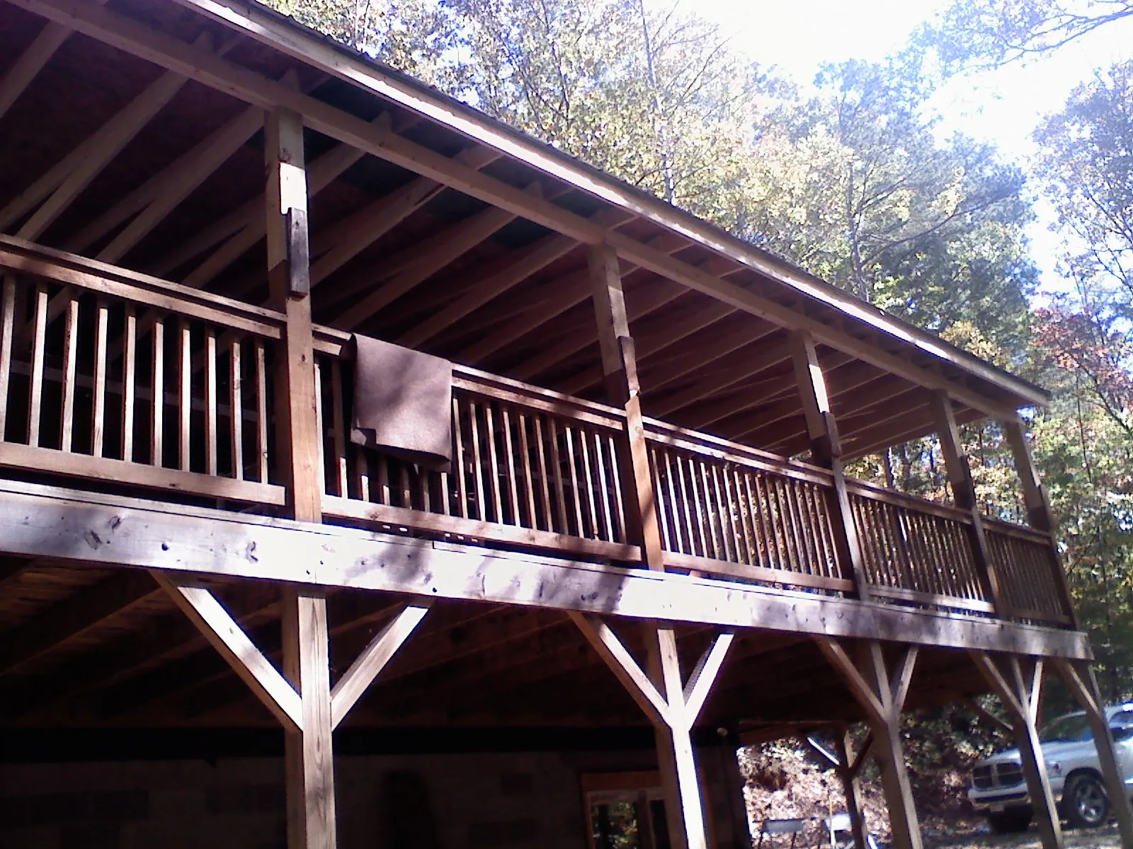 Timber framing under a new elevated porch and deck — Roof Leak Repair in Copiague by Roofing Brothers